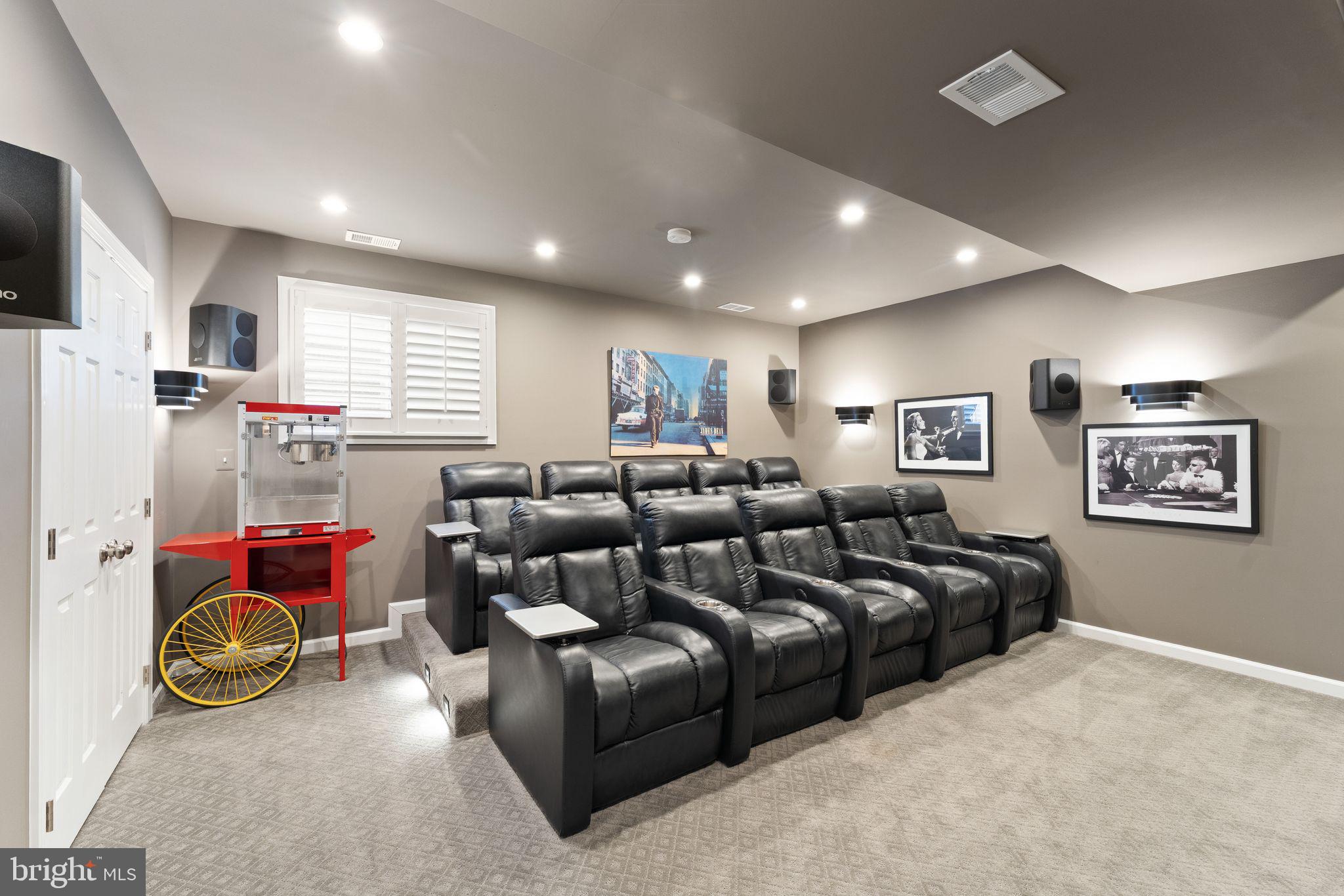 43524 Jackson Hole Circle Leesburg, VA 20176 - Photo 72 of 149 a living room with furniture a flat screen tv and a window