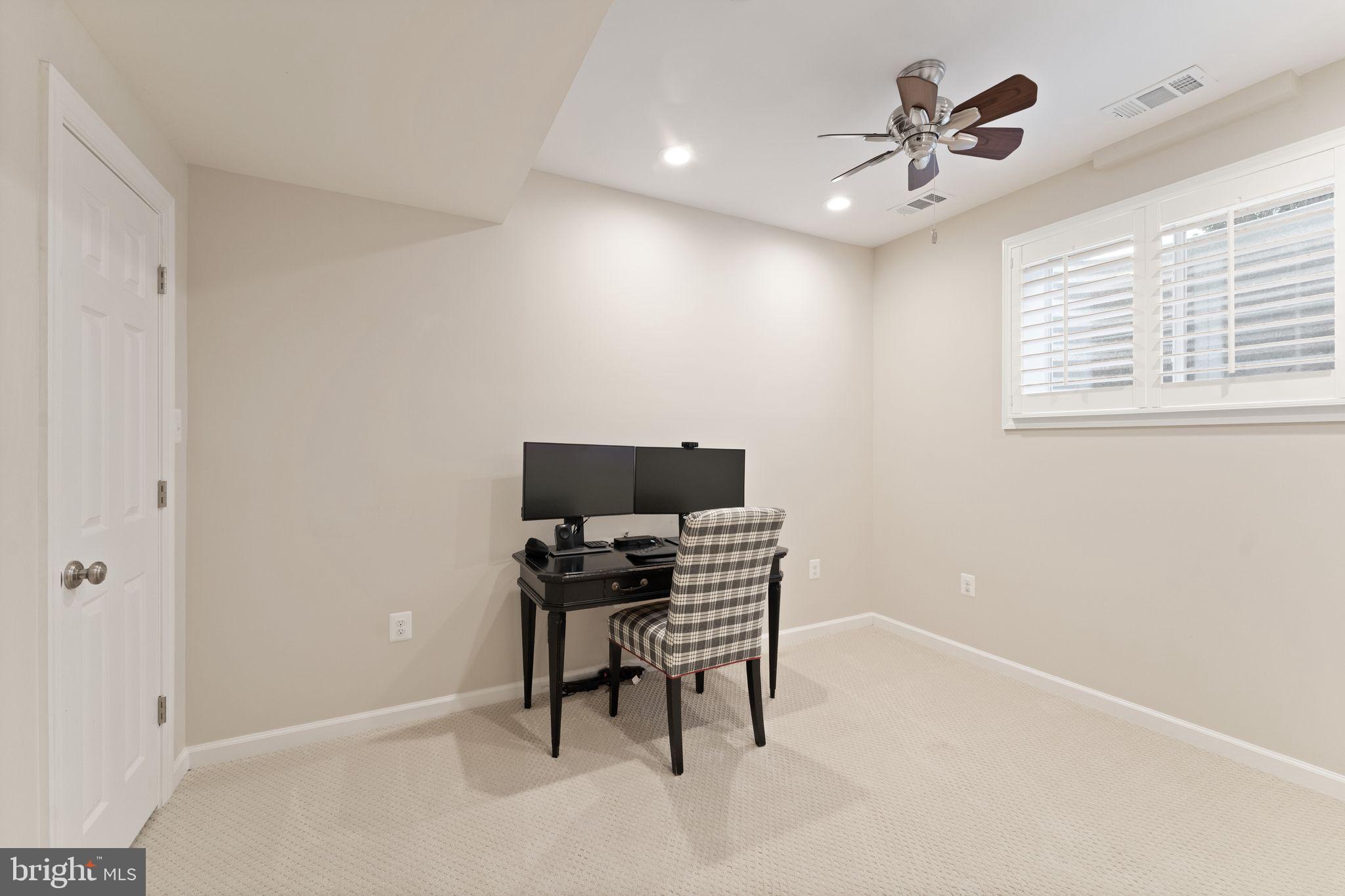43524 Jackson Hole Circle Leesburg, VA 20176 - Photo 74 of 149 a view of a workspace with furniture and a window