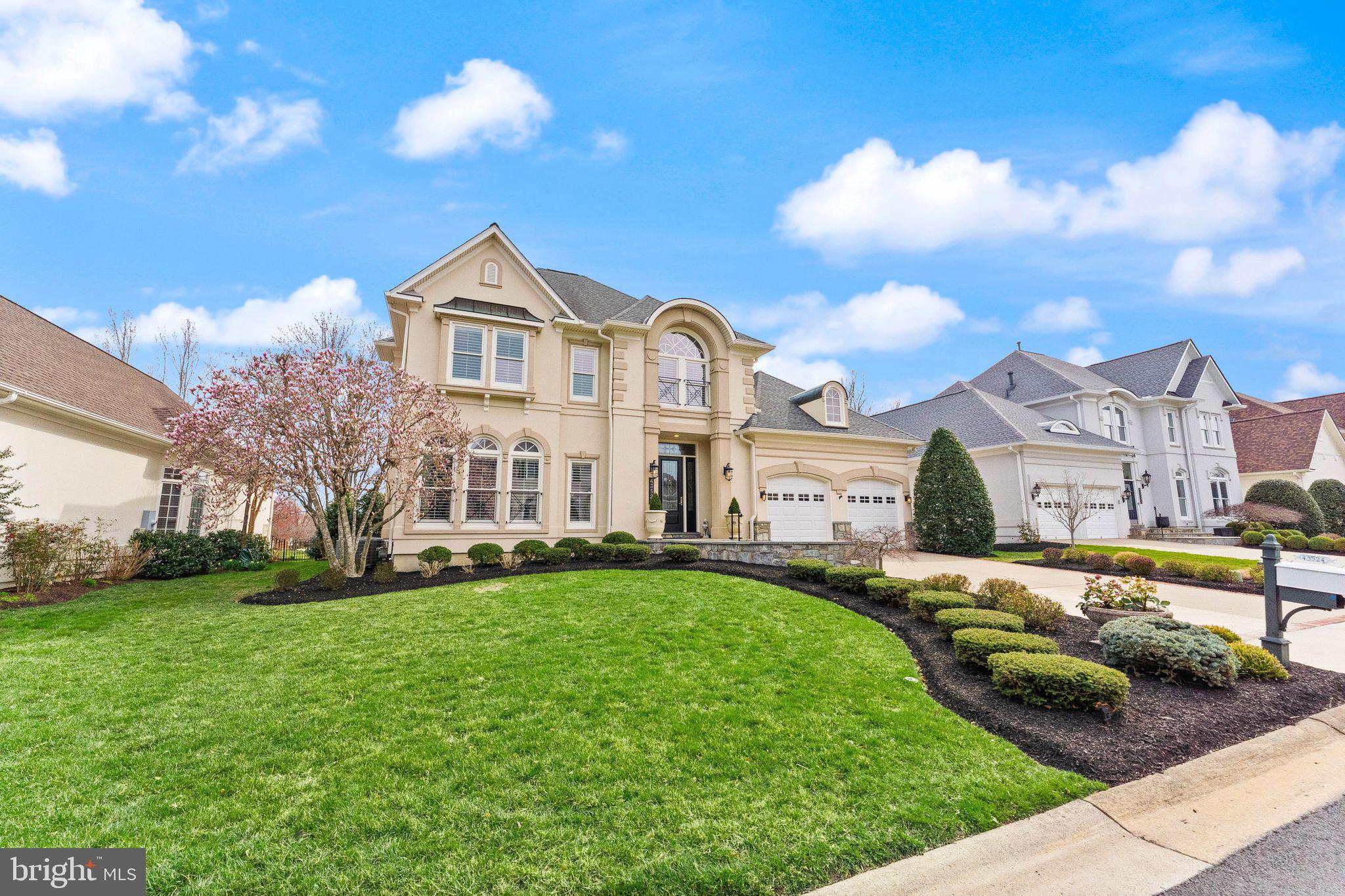 43524 Jackson Hole Circle Leesburg, VA 20176 - Photo 95 of 149 a front view of a house with a yard