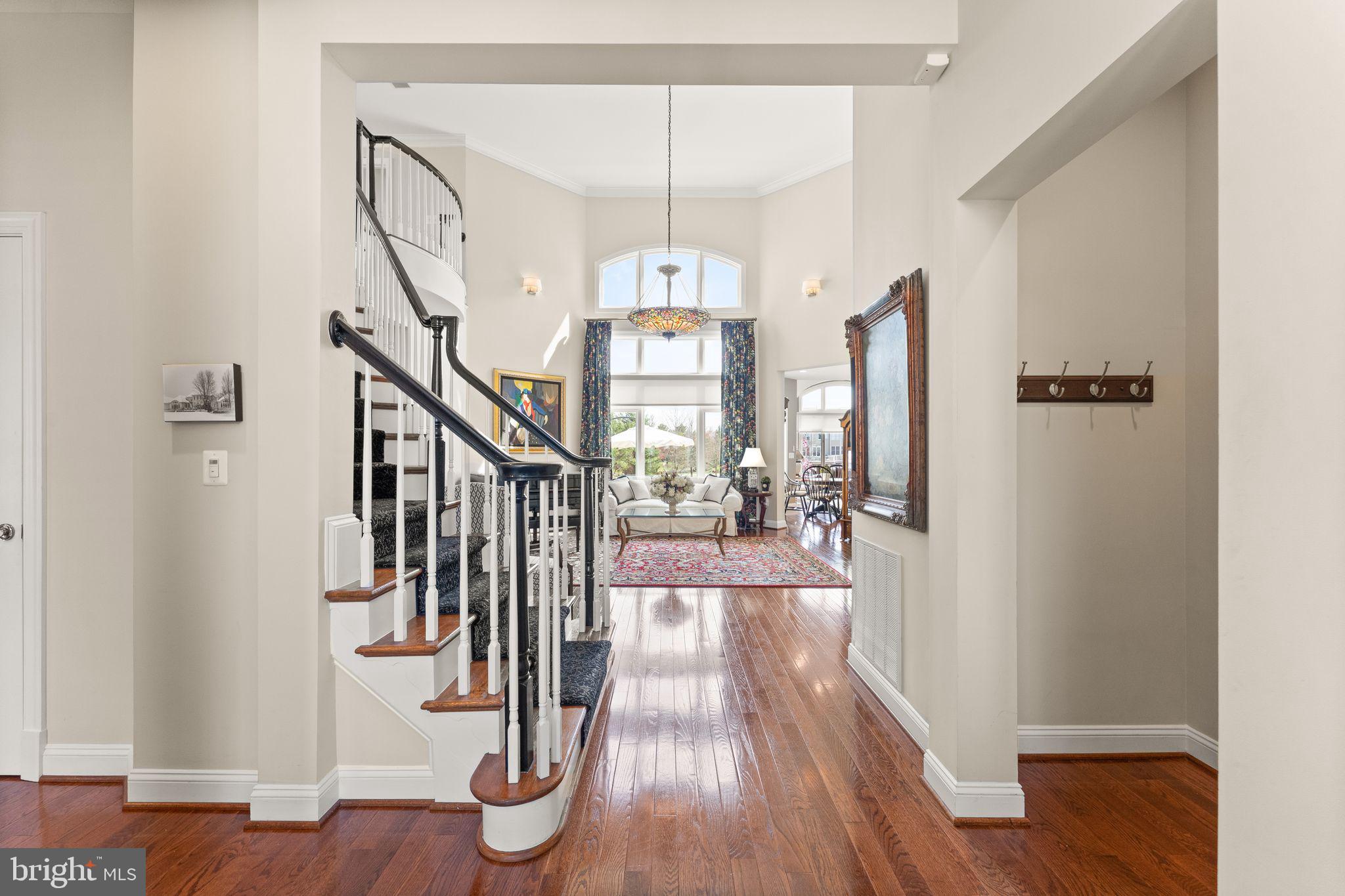 43524 Jackson Hole Circle Leesburg, VA 20176 - Photo 10 of 149 a view of entryway and hall with wooden floor