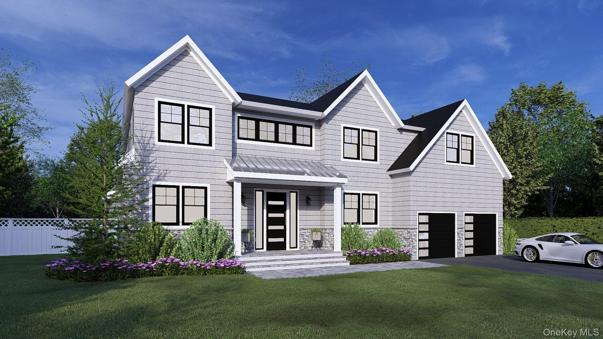 78 Crescent Beach Road Glen Cove, NY 11542 - Photo 2 of 5 a front view of a house with a yard and garage