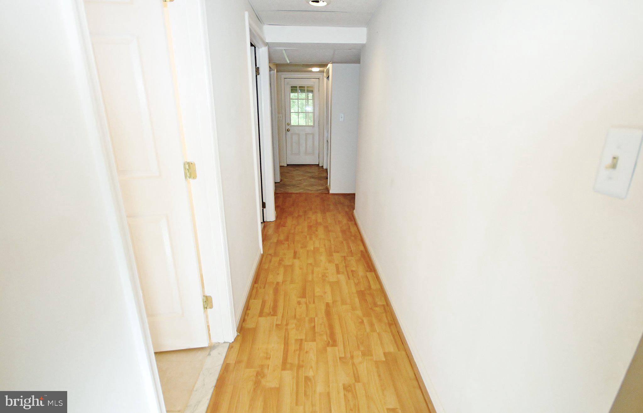 5504 Inverchapel Road Springfield, VA 22151 - Photo 35 of 51 Bright and inviting hallway awaits you.