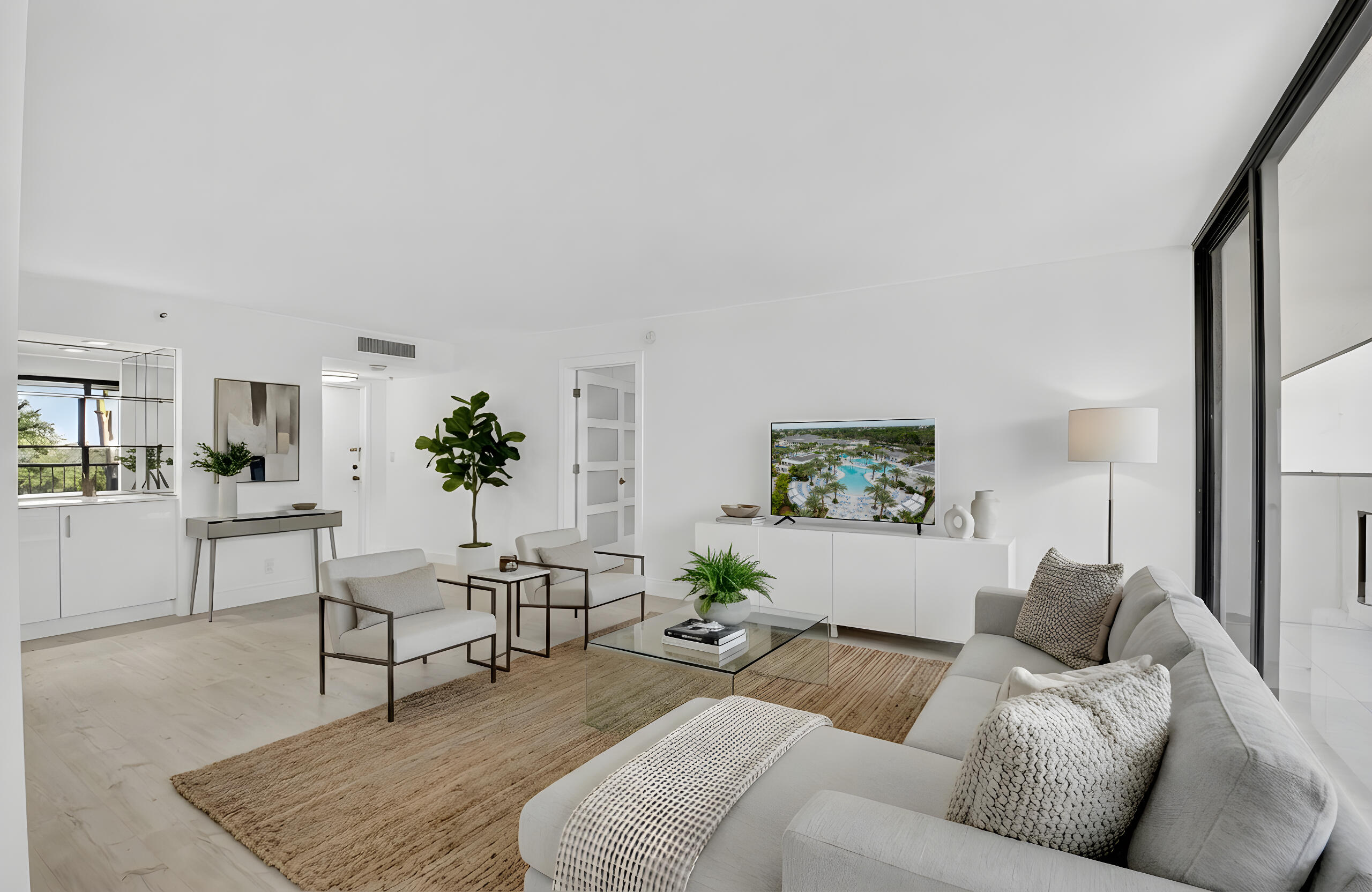 7738 Lakeside Boulevard, Unit 352 Boca Raton, FL 33434 - Photo 1 of 60 living-room-staged-tv
