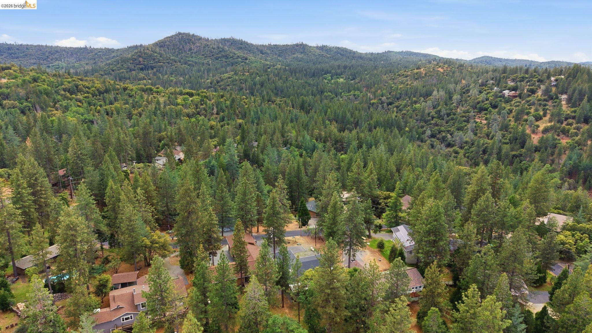 12068 Breckenridge Road Groveland, CA 95321 - Photo 31 of 55 Drone / aerial view of a mountain backdrop