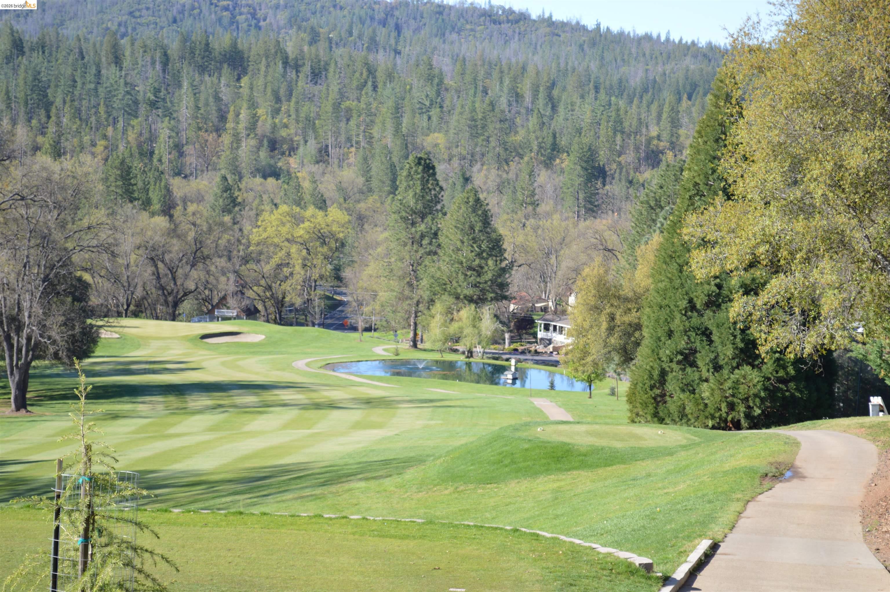 12068 Breckenridge Road Groveland, CA 95321 - Photo 42 of 55 View of community with view of golf course and a water view