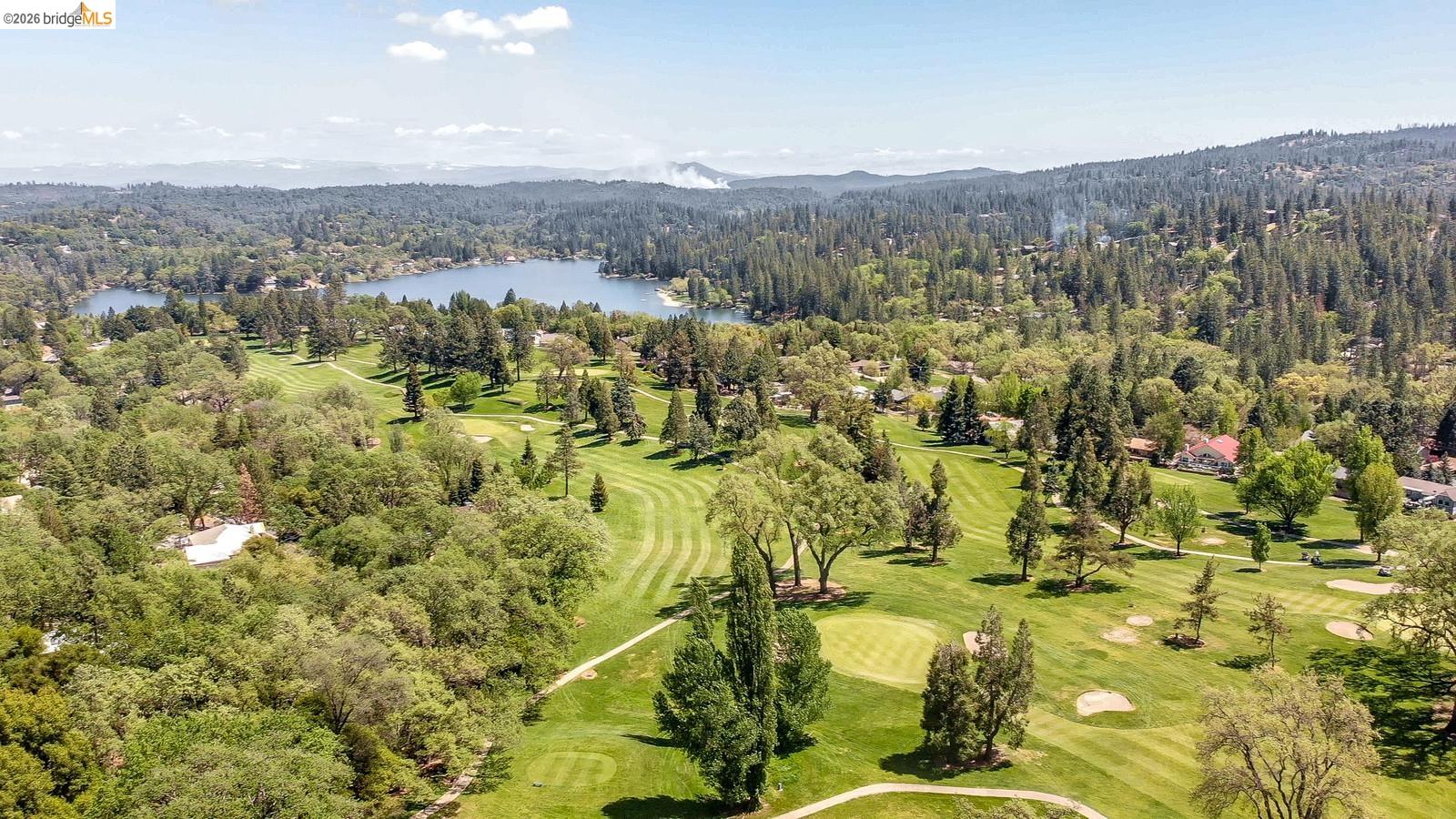 12068 Breckenridge Road Groveland, CA 95321 - Photo 46 of 55 Drone / aerial view of a golf club and a water and mountain view