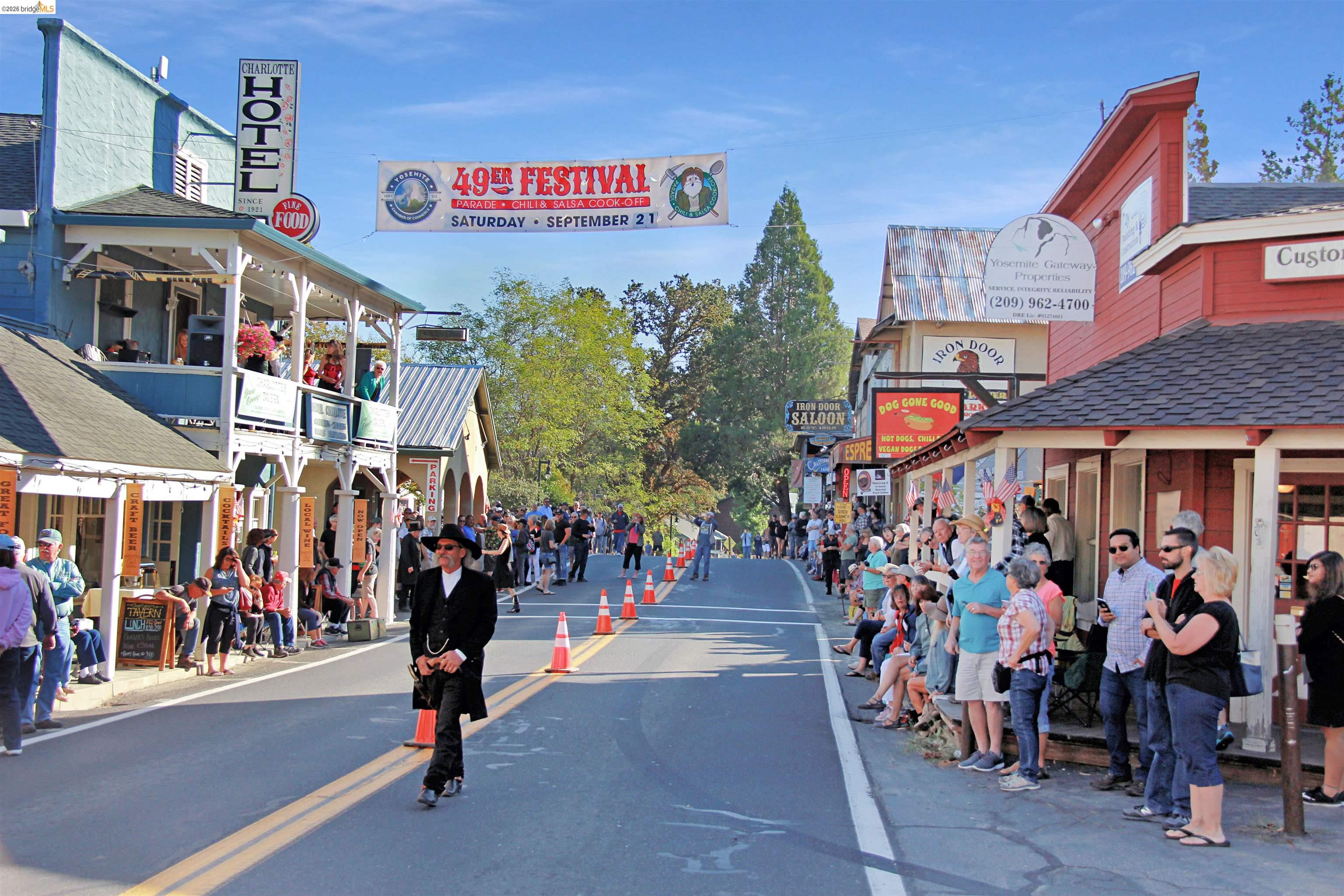 12068 Breckenridge Road Groveland, CA 95321 - Photo 52 of 55 View of asphalt street featuring sidewalks, curbs, and street lights