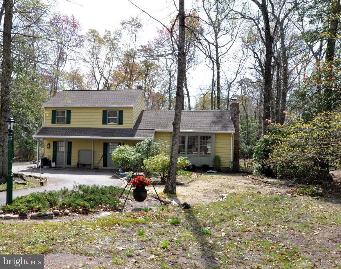 208 Ridge Road Southampton, NJ 08088 - Photo 1 of 34 front view of a house with a yard