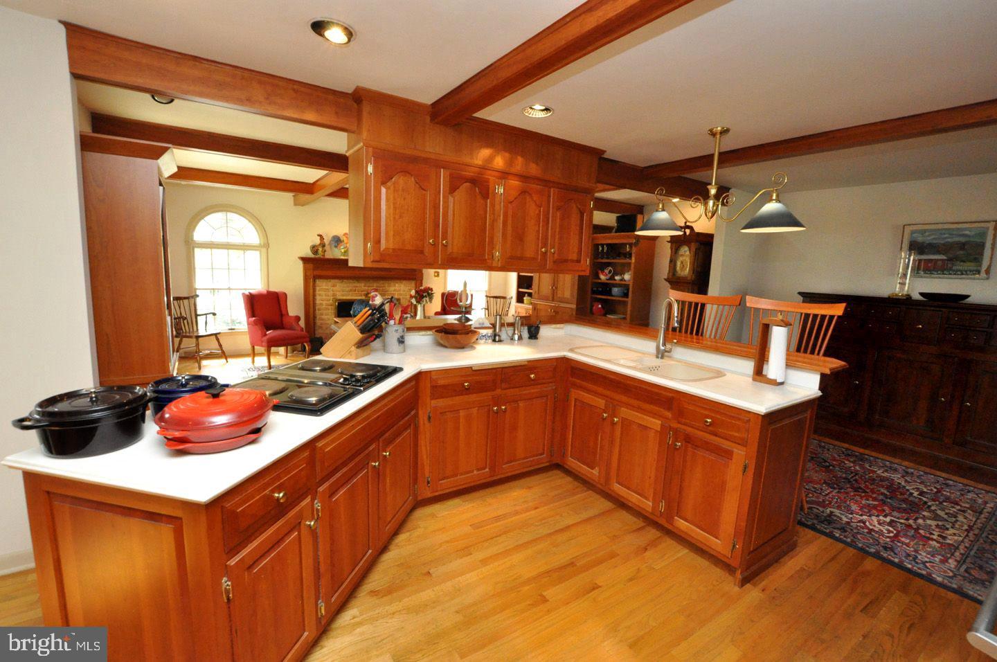 208 Ridge Road Southampton, NJ 08088 - Photo 15 of 34 a kitchen with stainless steel appliances granite countertop a stove and a sink