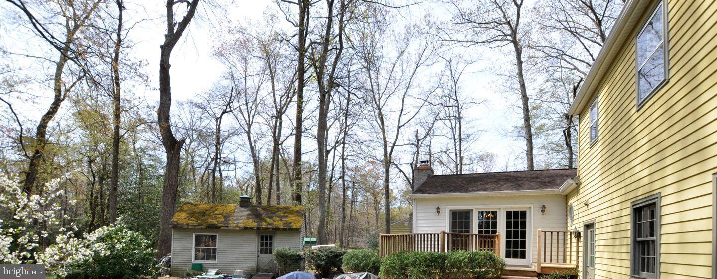 208 Ridge Road Southampton, NJ 08088 - Photo 32 of 34 front view of a building with a trees