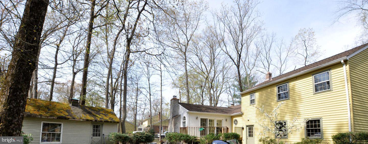 208 Ridge Road Southampton, NJ 08088 - Photo 34 of 34 front view of a house with a trees