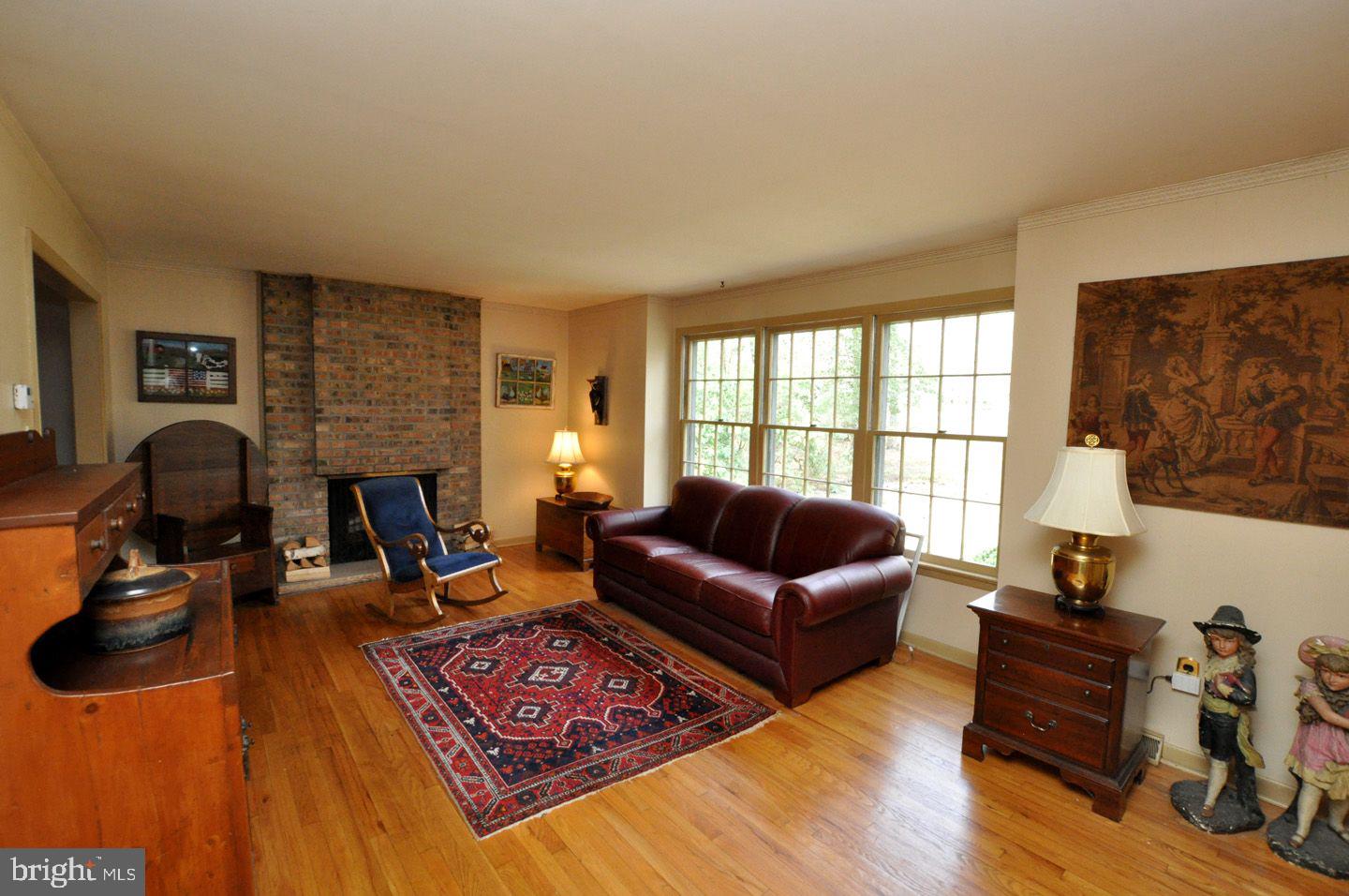 208 Ridge Road Southampton, NJ 08088 - Photo 10 of 34 a living room with furniture and a flat screen tv