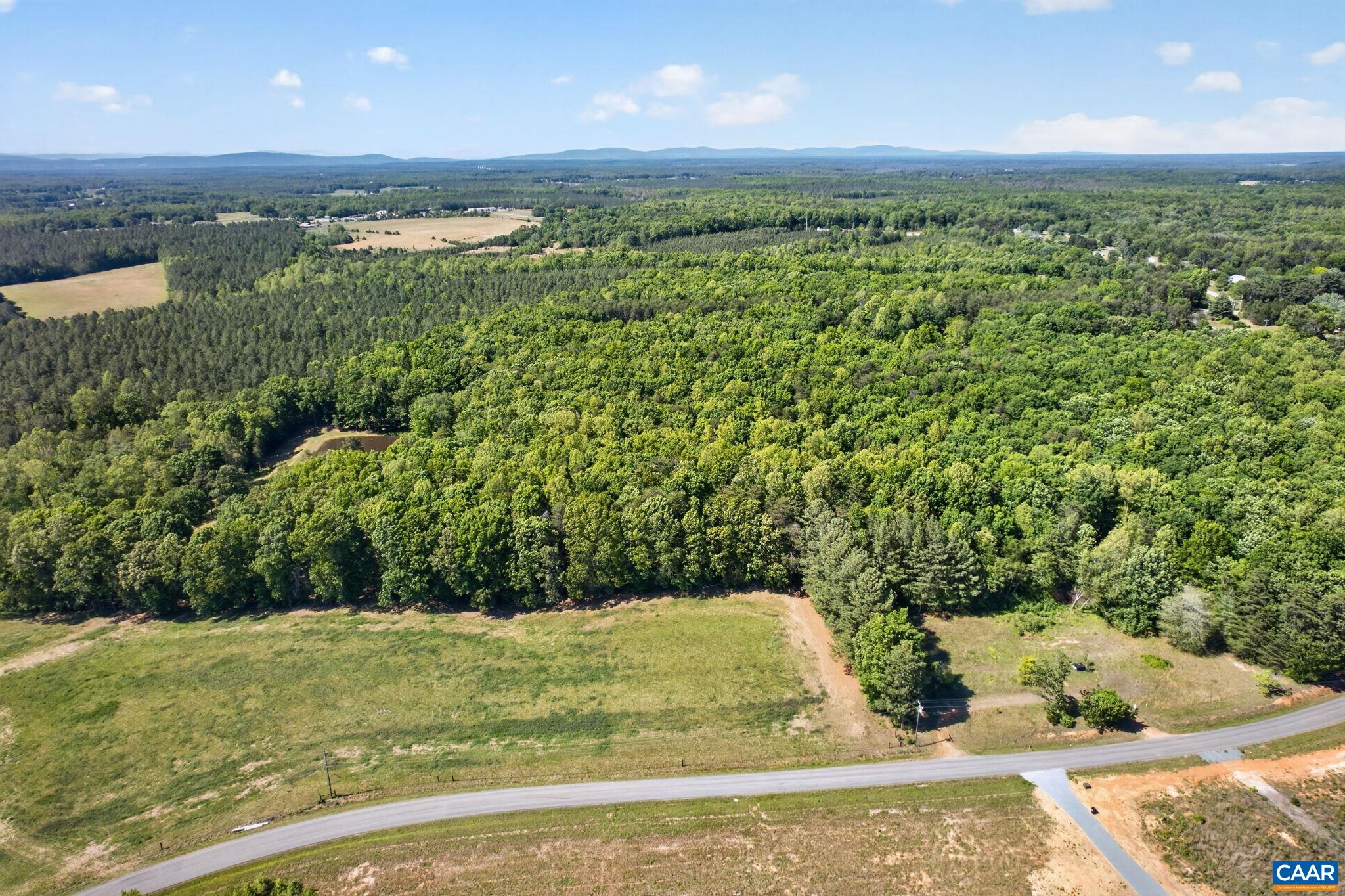 Lot 2 Shores Road Palmyra, VA 22963 - Photo 2 of 6 a view of a yard with an outdoor space and seating