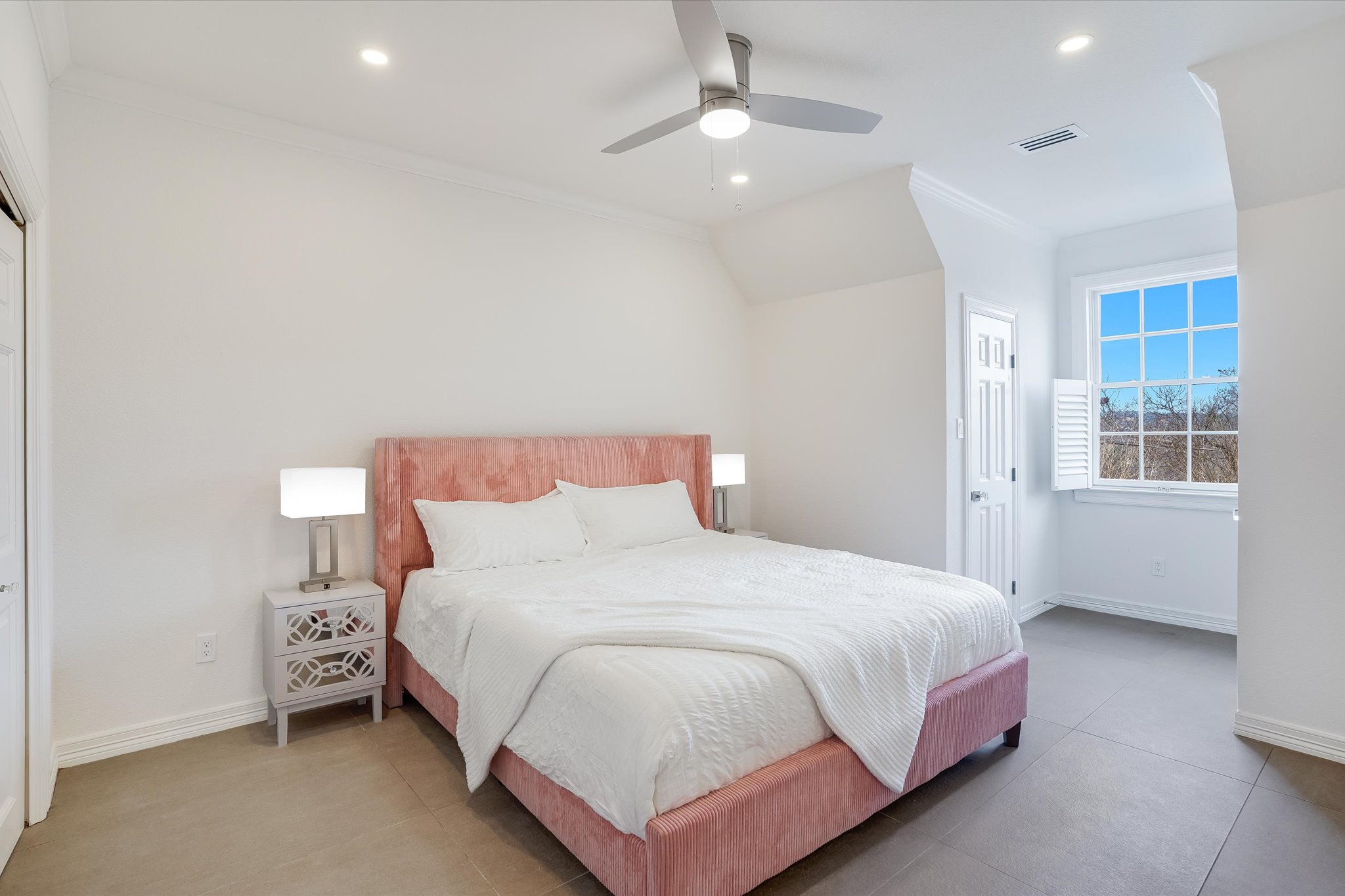 3705 Gilbert Street, Unit B Austin, TX 78703 - Photo 23 of 35 Bedroom with recessed lighting, ornamental molding, and 3 closets