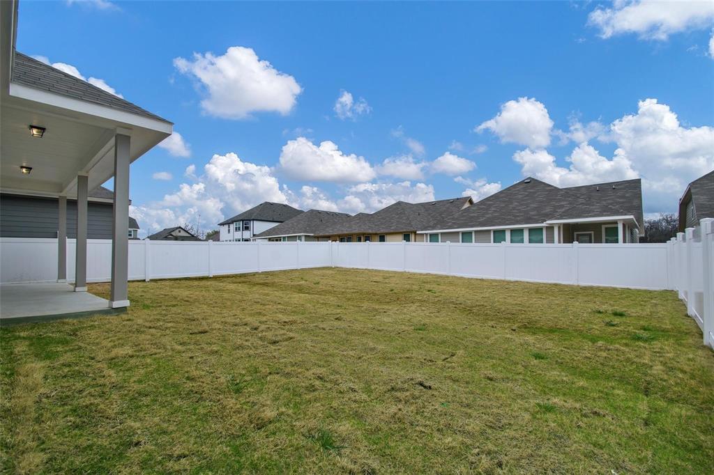 1613 Abbottsford Avenue Providence Village, TX 76227 - Photo 7 of 14 a view of a big room with table and chairs
