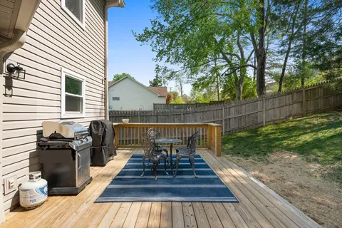 a view of a chairs on the roof deck