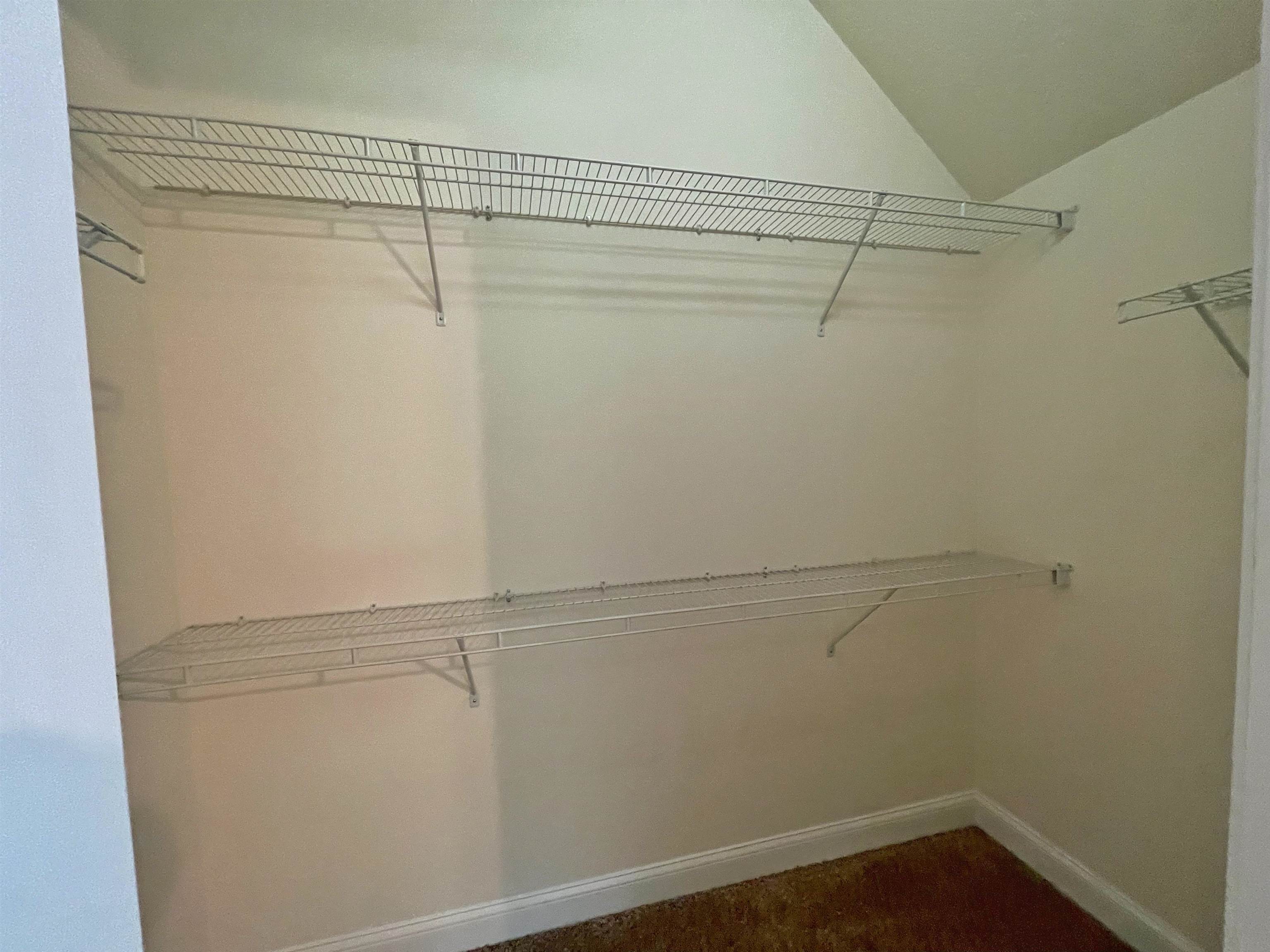 157 West Village Drive St. Augustine, FL 32095 - Photo 15 of 43 a view of a room with racks on the wall