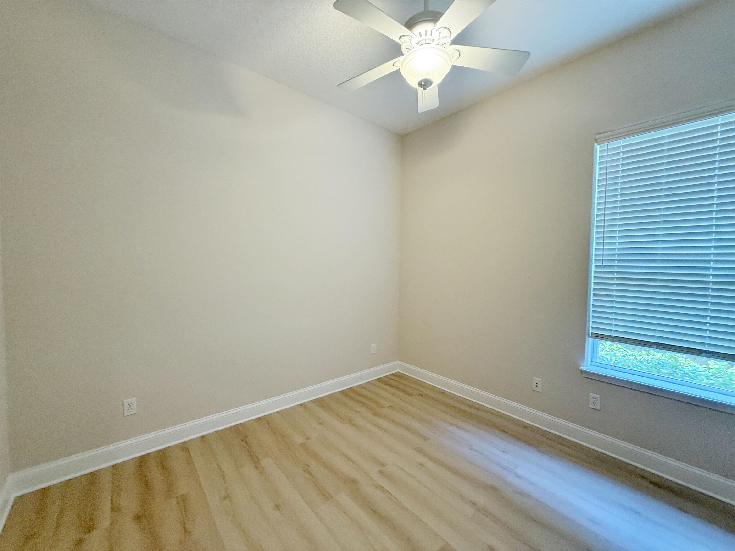 157 West Village Drive St. Augustine, FL 32095 - Photo 22 of 43 an empty room with a window