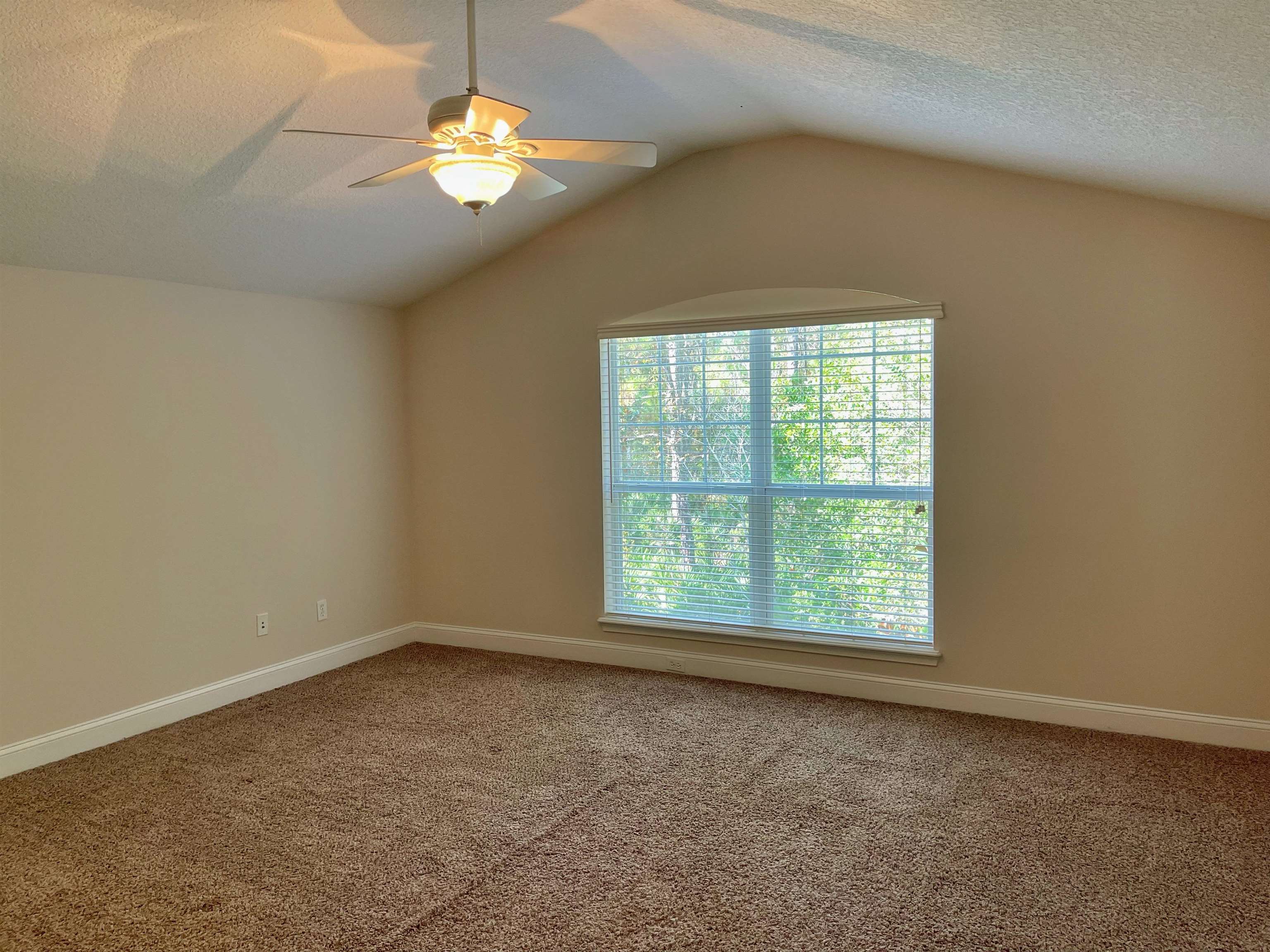 157 West Village Drive St. Augustine, FL 32095 - Photo 27 of 43 an empty room with a window