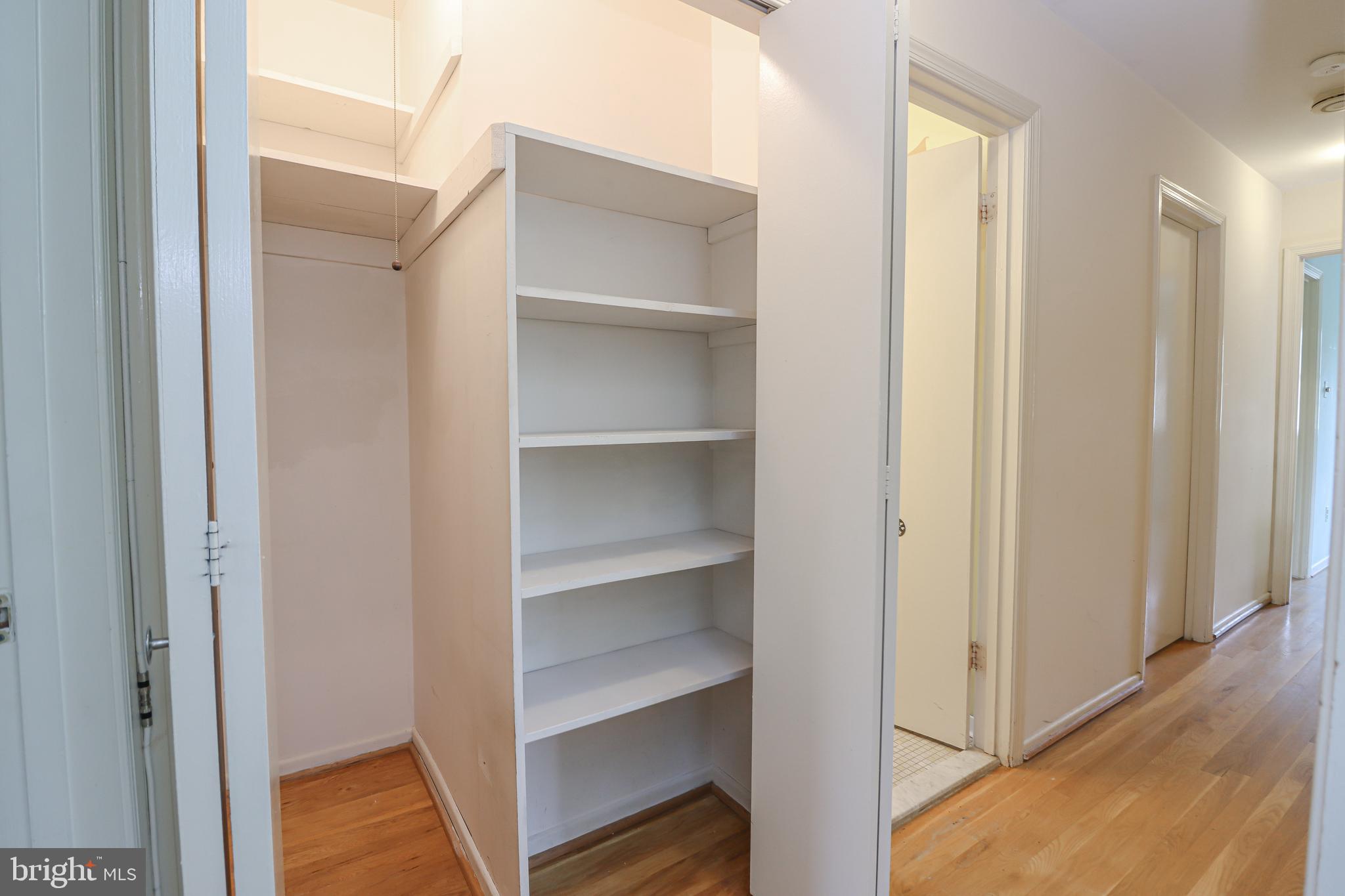 8728 Old Courthouse Road Vienna, VA 22182 - Photo 32 of 58 Large Linin and Storage Closet in Hall Way