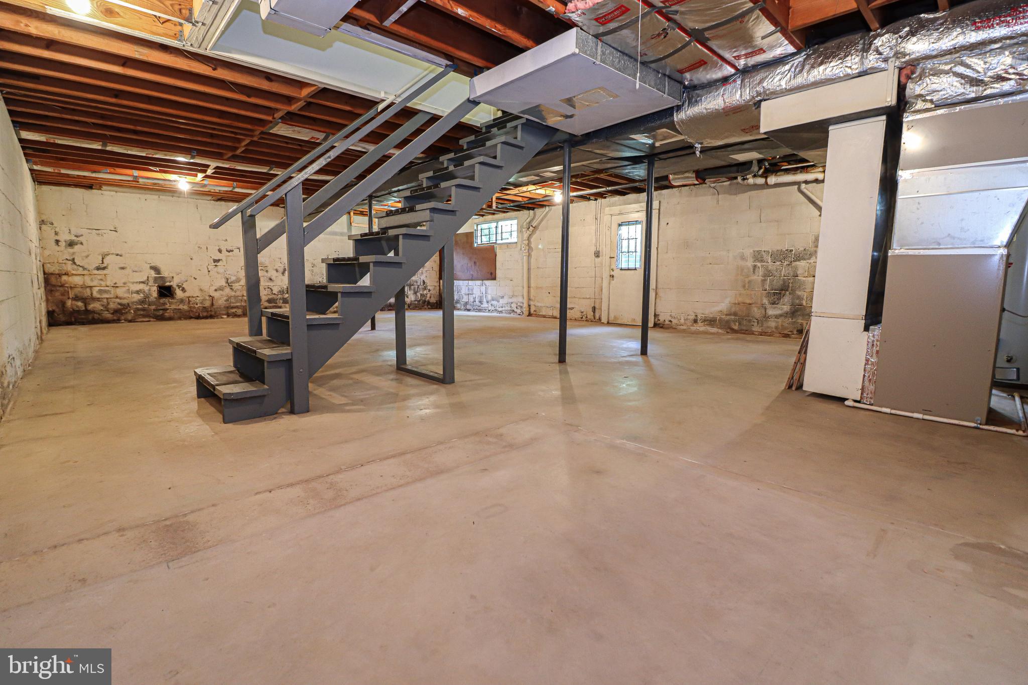 8728 Old Courthouse Road Vienna, VA 22182 - Photo 41 of 58 Massive Open Unfinished Basement