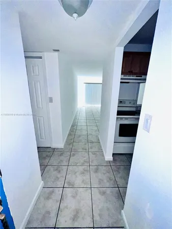 a view of entryway with a front door