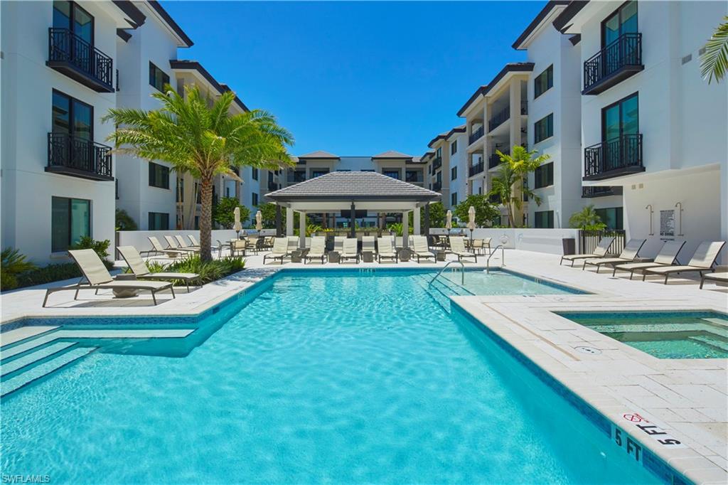 1130 3rd Avenue South, Unit 508 Naples, FL 34102 - Photo 3 of 4 a view of a fountain with a patio