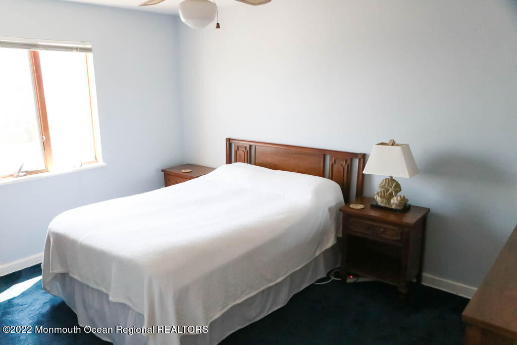 5 Vine Court Long Branch, NJ 07740 - Photo 18 of 30 a bedroom with a bed and window