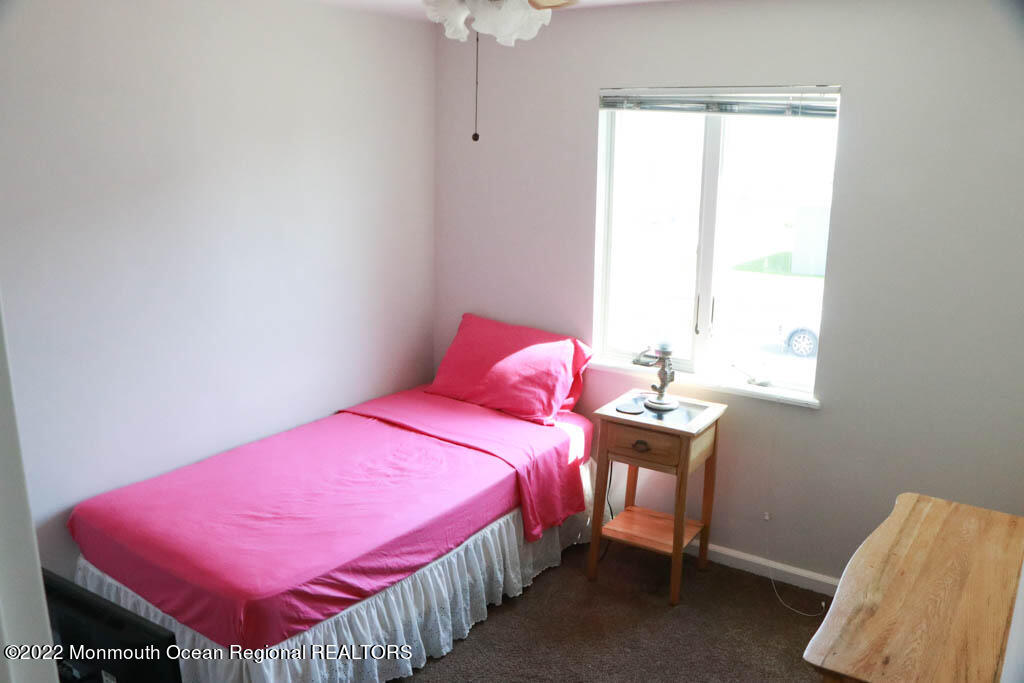5 Vine Court Long Branch, NJ 07740 - Photo 23 of 30 a bedroom with a bed and a window