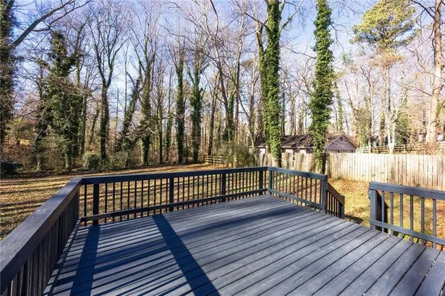 a view of deck with wooden floor and outdoor seating