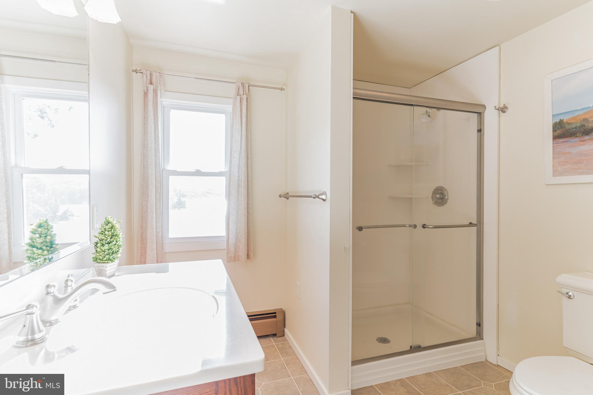 8155 Sycamore Road Lusby, MD 20657 - Photo 31 of 43 Upper level full bathroom even has a view.