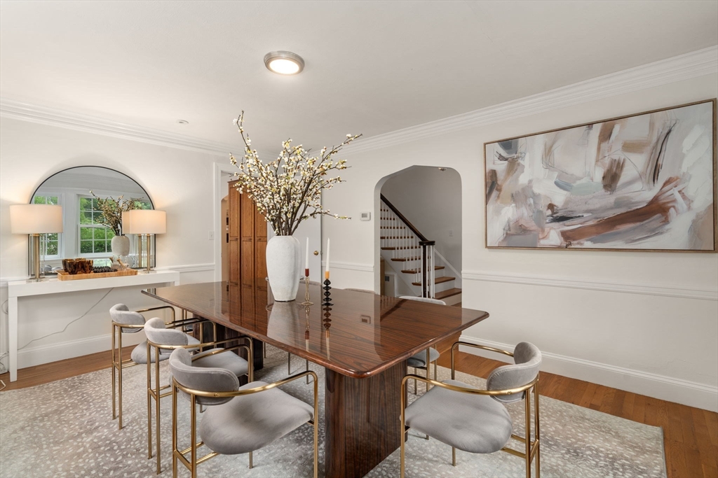 16 Duxbury Road Newton, MA 02459 - Photo 11 of 30 a view of a dining room with furniture and wooden floor