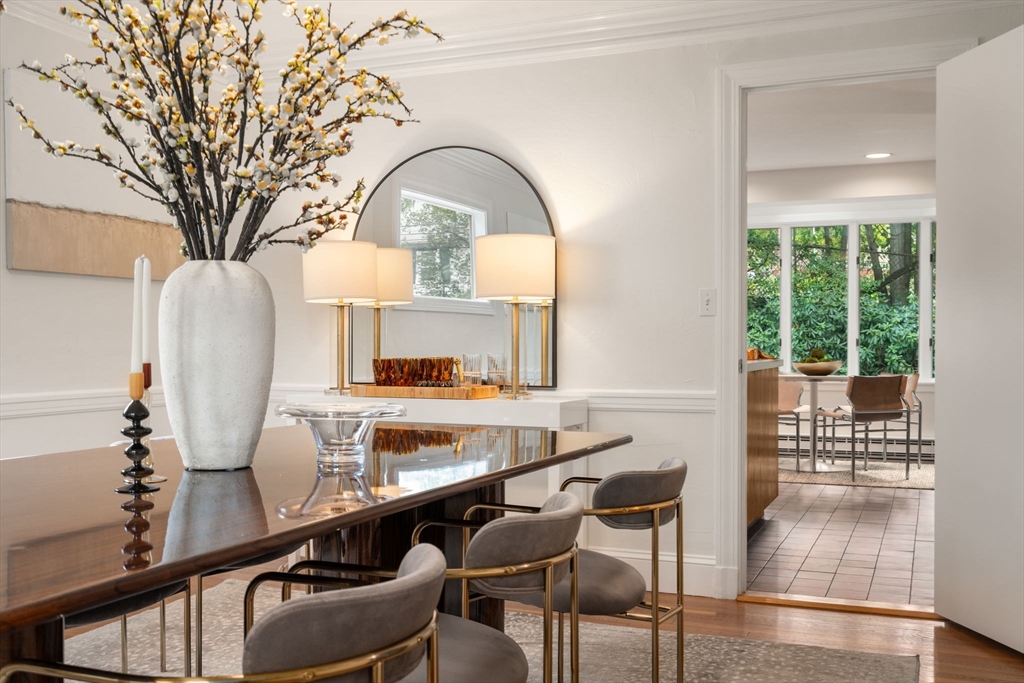 16 Duxbury Road Newton, MA 02459 - Photo 12 of 30 a room with a table chairs and entryway