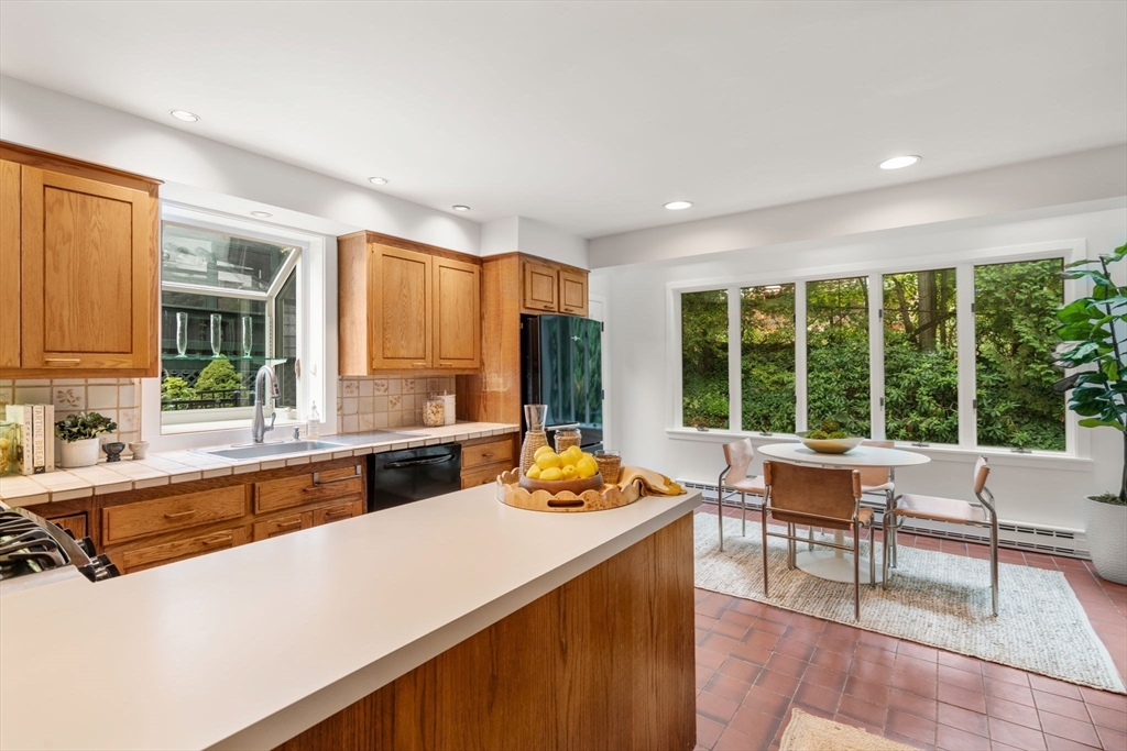 16 Duxbury Road Newton, MA 02459 - Photo 15 of 30 a living room with furniture and large windows