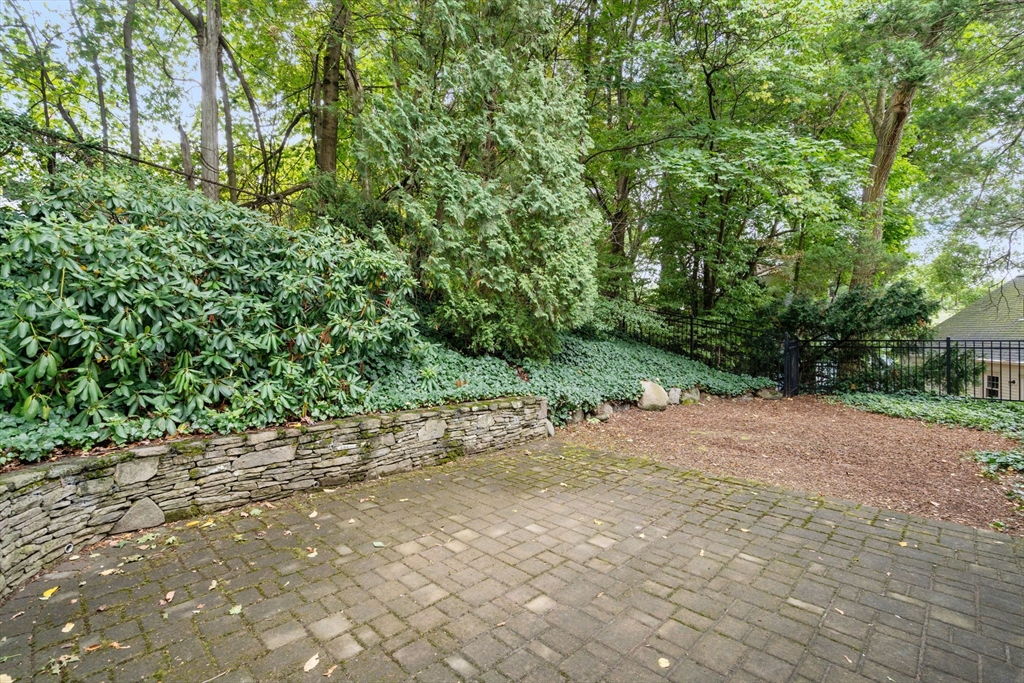 16 Duxbury Road Newton, MA 02459 - Photo 29 of 30 a view of a dirt road with trees in the background