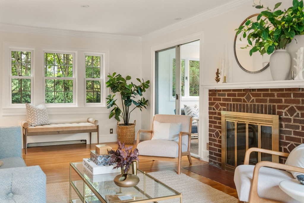 16 Duxbury Road Newton, MA 02459 - Photo 5 of 30 a living room with furniture a window and a fireplace