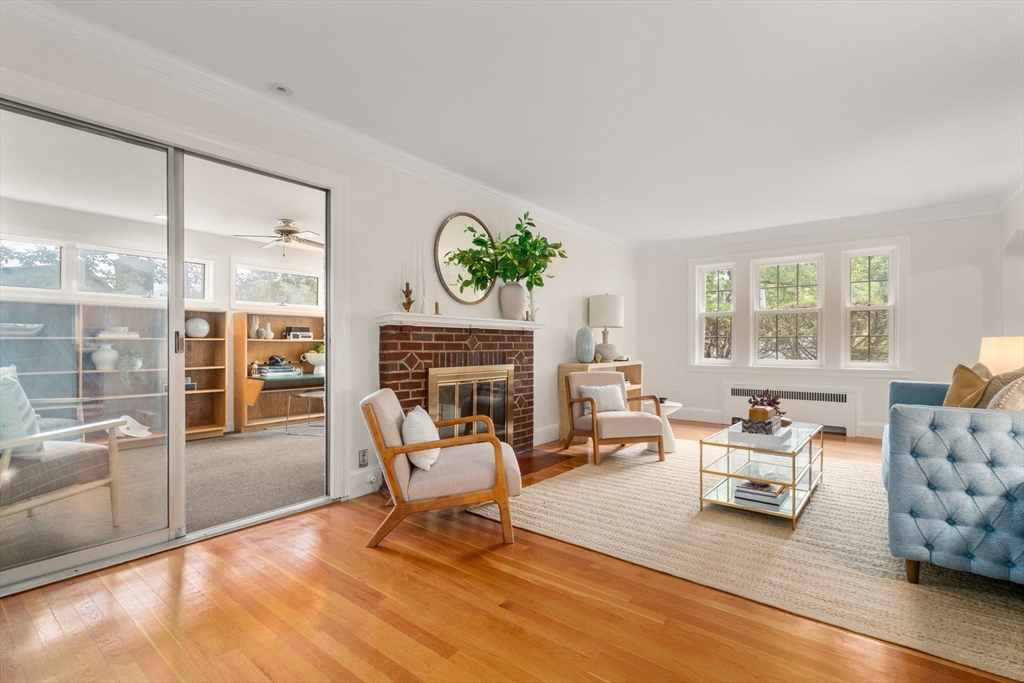 16 Duxbury Road Newton, MA 02459 - Photo 6 of 30 a living room with furniture a fireplace and a table