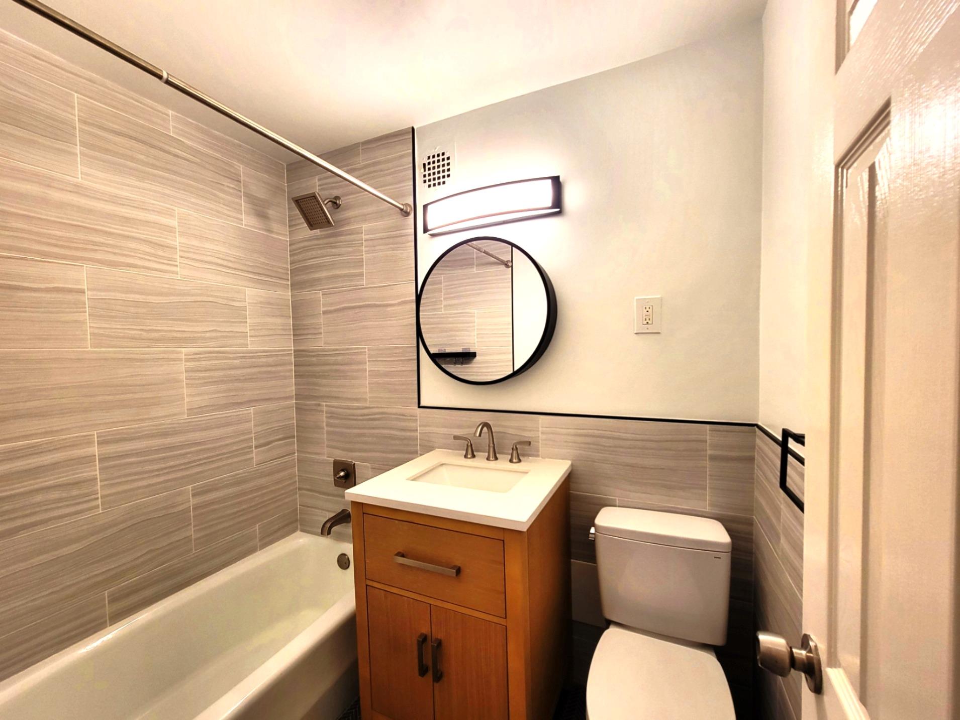 2736 Independence Avenue, Unit 4C Bronx, NY 10463 - Photo 4 of 8 Full bathroom with toilet, vanity, and shower / bath combination