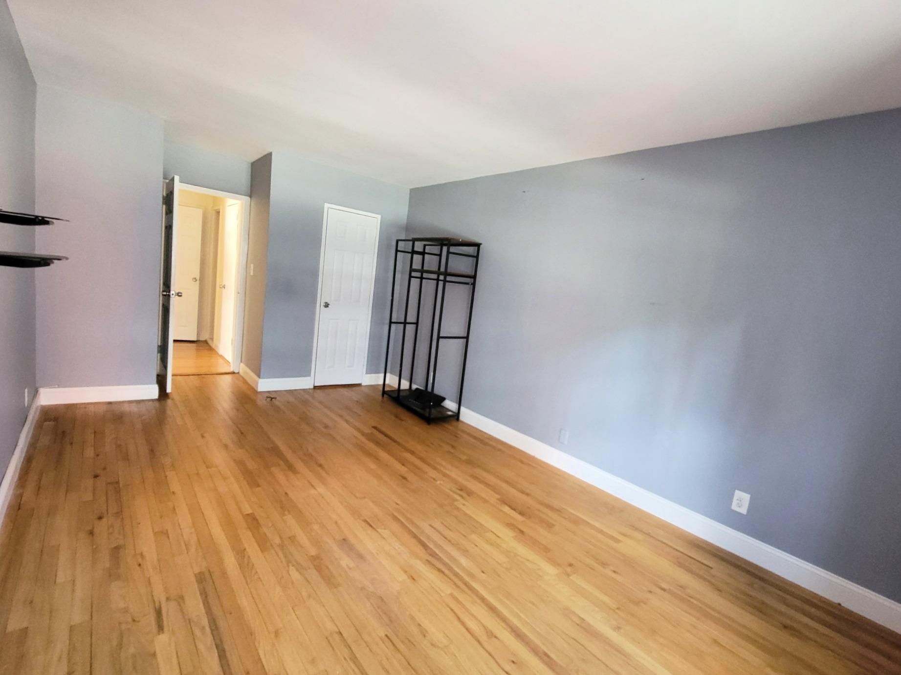 2736 Independence Avenue, Unit 4C Bronx, NY 10463 - Photo 6 of 8 Unfurnished room featuring light wood-type flooring and baseboards