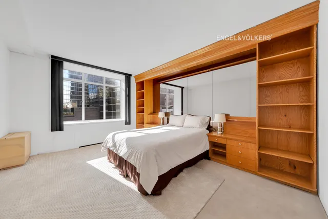 a kitchen with stainless steel appliances a sink a stove and a refrigerator