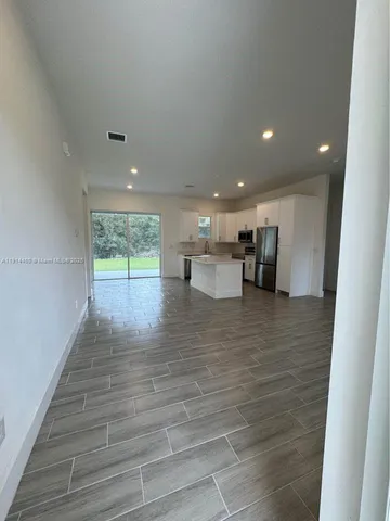 a view of kitchen with breakfast area
