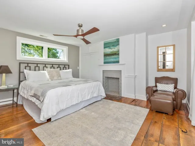 a bathroom with a bathtub and sink