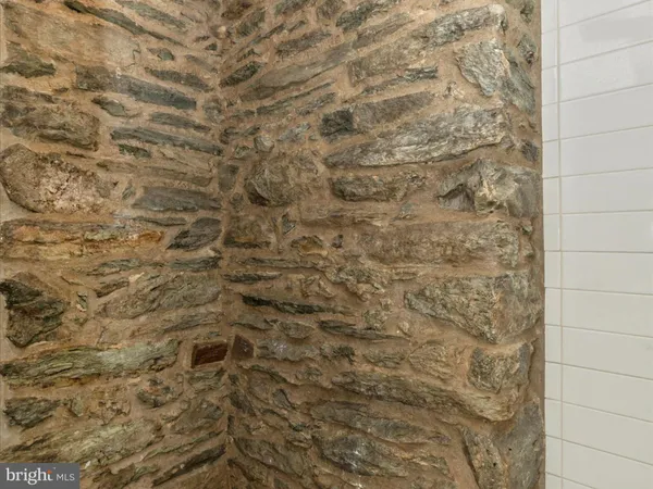 a view of a house with backyard porch and furniture