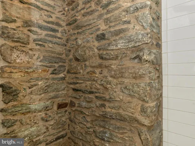 a view of a house with backyard porch and furniture