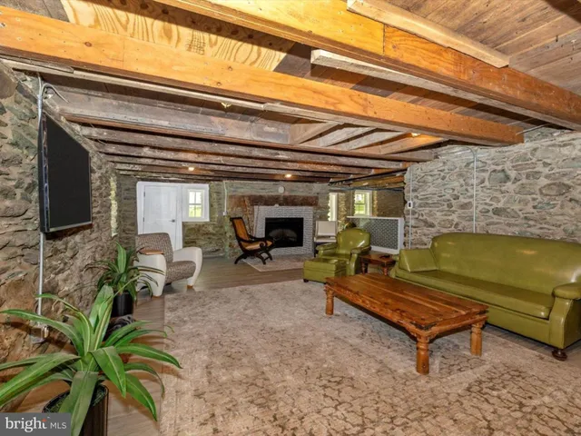 a swimming pool view with a outdoor seating space