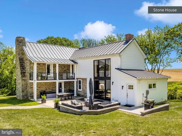 front view of a house with a swimming pool