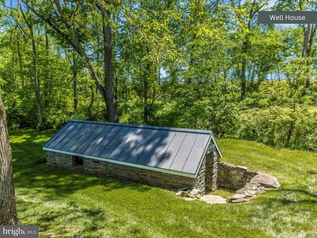 a view of a house with a big yard