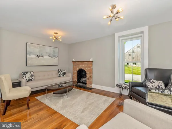 a view of a dining room with furniture and window