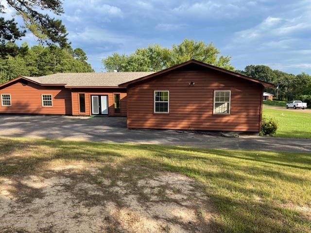 370 Walnut Grove Road Bolivar, TN 38008 - Photo 3 of 16 a view of a house with a yard
