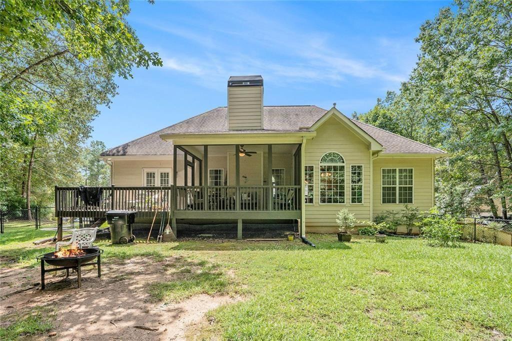3792 Falls Trail Winston, GA 30187 - Photo 24 of 33 a front view of a house with a garden